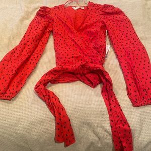 Red/black wrap top by Billabong X Sincerely Jules. Size XS and NWT.